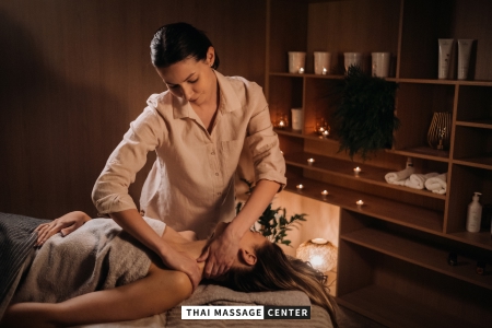 Traditional Thai massage therapist applying controlled pressure during a professional treatment in Cyprus